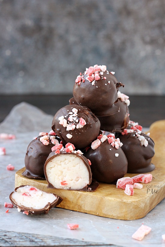 Incredibly simple Peppermint Truffles Recipe starts with a cream cheese base full of peppermint chips, rolled into balls then they're draped in chocolate... I want to be draped in chocolate! Peppermint Truffles