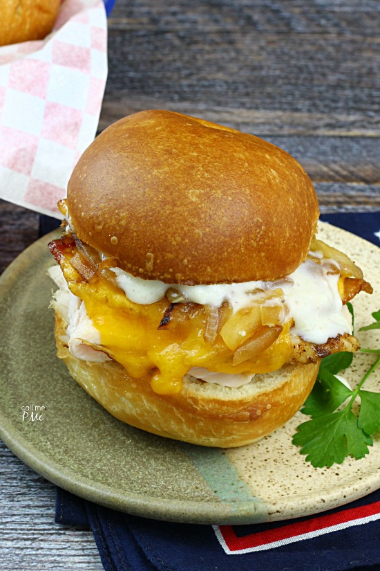 Kentucky Hot Brown Sliders Recipeย the traditional open-face sandwich is turned into a hand-held treat perfect for game day. It isย indescribably delicious with various flavors and texture. #ham #turkey #cheddar #sliders #sandwiches #Kentuckyhotbrown #tailgating #recipes Kentucky Hot Brown Sliders Recipe from callmepmc.com is a hand-held take on the classic reicpe