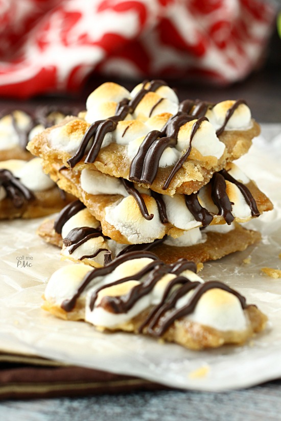 S'mores Crack Candy Recipe this popular toffee and chocolate candy is kicked up with the additions of smores toppings, one bite & you'll be hooked. 