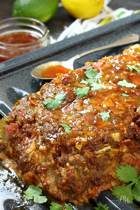 Mexican Meatloaf recipe is a tasty twist on a classic. This hearty meatloaf recipe uses spicy flavors of cumin, cilantro, green chiles and chorizo. Mexican Meatloaf recipe