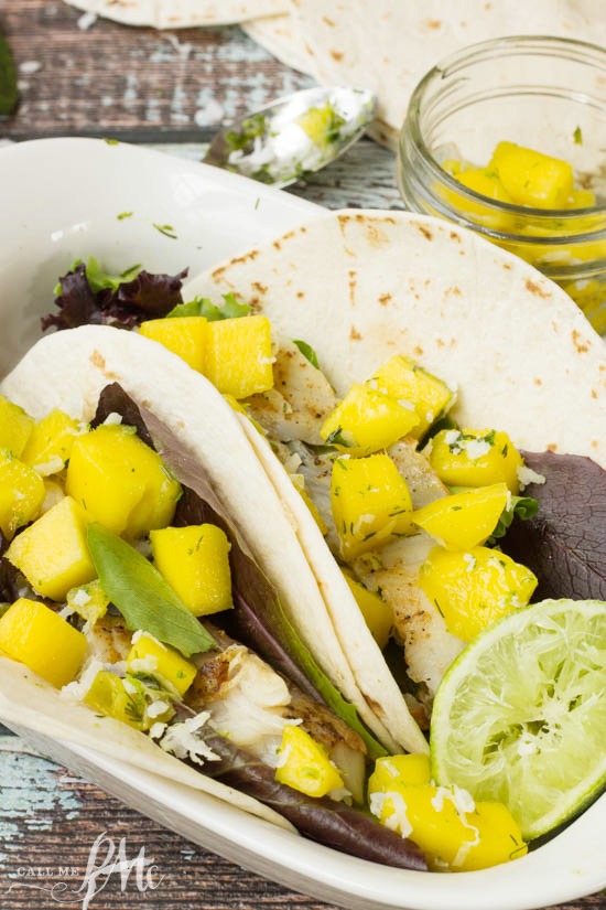 Bright and fresh, Fish Tacos with Mango Coconut Lime Salsa is an easy weekday dinner that you can have ready in less than 30 minutes!