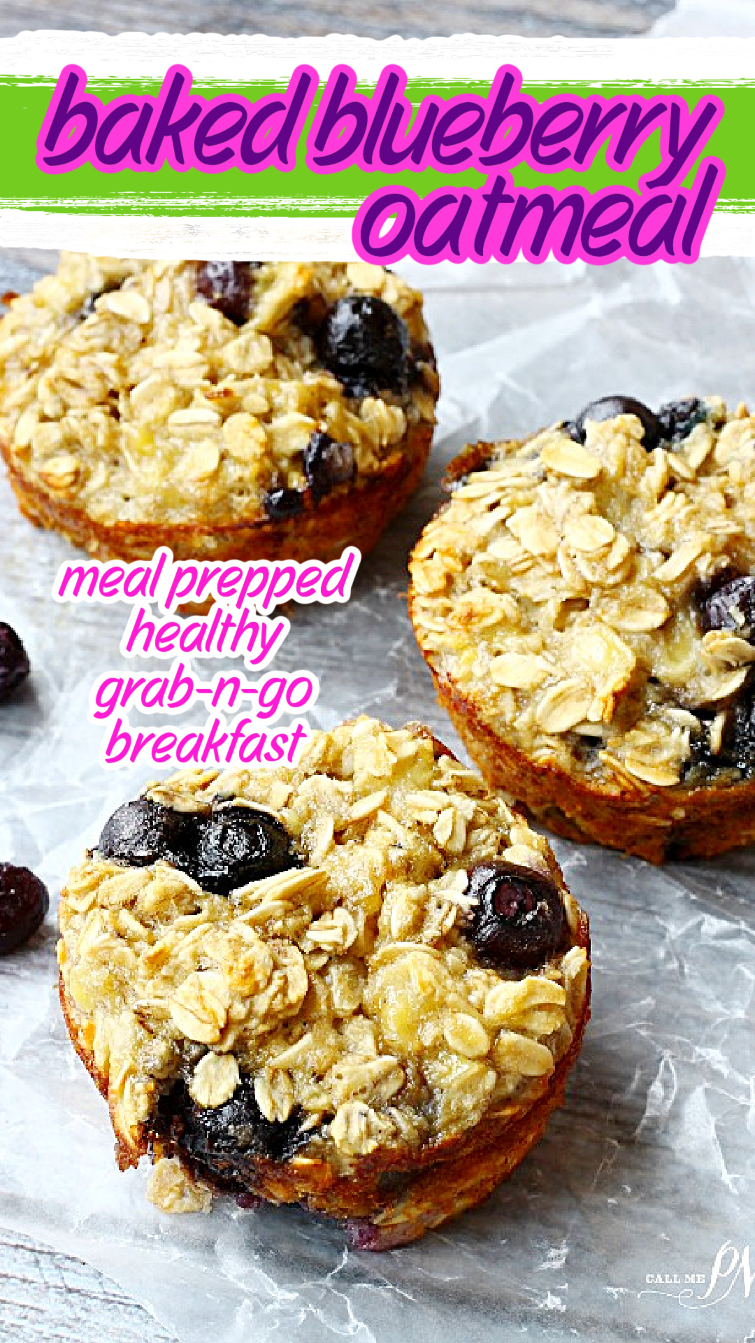 Three homemade Oat Cups rest on a sheet of parchment paper atop a wooden surface.