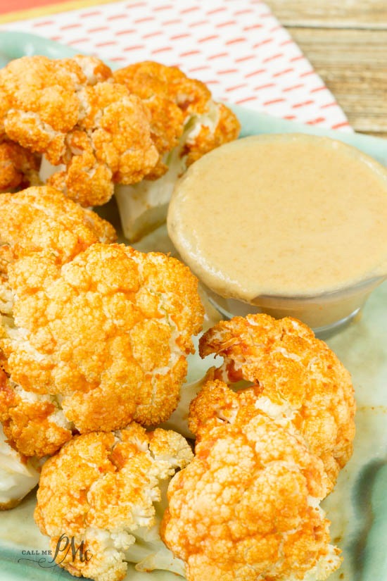Bang Bang Baked Cauliflower Bites with Peanut Butter Dipping Sauce is spicy and full of flavor. It's an almost fat-free version of the popular restaurant appetizer made healthier! Just three ingredients make up my bang bang sauce so it's easy to recreate at home.