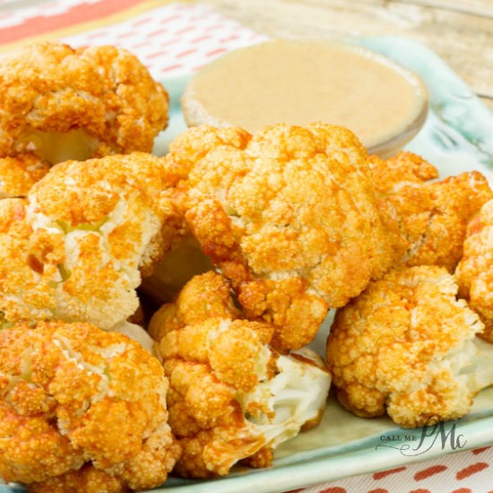 Baked Cauliflower. Bang Bang Baked Cauliflower Bites with Peanut Butter Dipping Sauce is spicy and full of flavor. It's an almost fat-free version of the popular restaurant appetizer made healthier! Just three ingredients make up my bang bang sauce so it's easy to recreate at home.