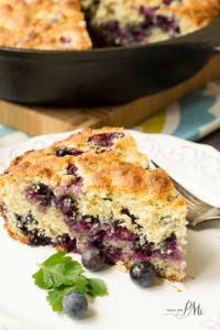 blueberry buttermilk cornbread slice on a plate.