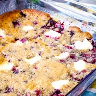 Blueberry Cream Cheese Dump Cake has got to be the easiest cake in the world to make. Fresh blueberries sit on the bottom with chunks of cream cheese scattered throughout. #cake #cobbler #blueberries #cream #creamcheese #recipe #dessert #callmepmc