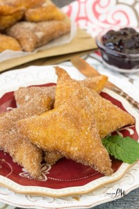 crescent roll beignets on a plate.