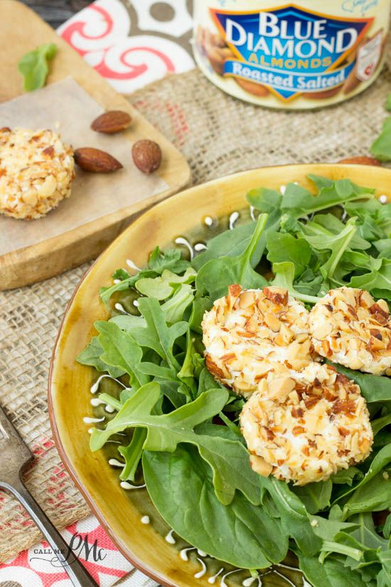 goat cheese appetizers plated on fresh greens.