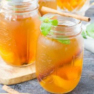 Peach Cobbler Moonshine recipe is a tasty peach cocktail with cinnamon & two different alcohols. Perfect for football games & hunting season. #tailgating #peach #moonshine #cocktails #recipe #alcohol #freshpeaches #homemade #Everclear #howtomake #fresh #cocktailsrecipe #cocktailsdrinks
