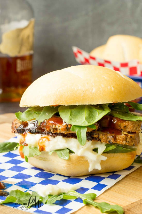 Pork Tenderloin Sliders with Bourbon Peach BBQ Sauce are stacked high with tender pork, creamy slaw and tangy, sweet Peach BBQ Sauce that's been spiked with bourbon. pork sandwiches