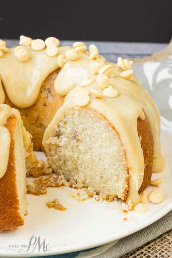 Greek Yogurt Strawberry Jam Pound Cake is an awesome tasting pound cake moist and sweet with Greek yogurt in the batter and topped with a white chocolate ganache. Dessert on a plate.