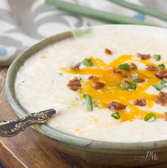 Bowl of soup on a table.