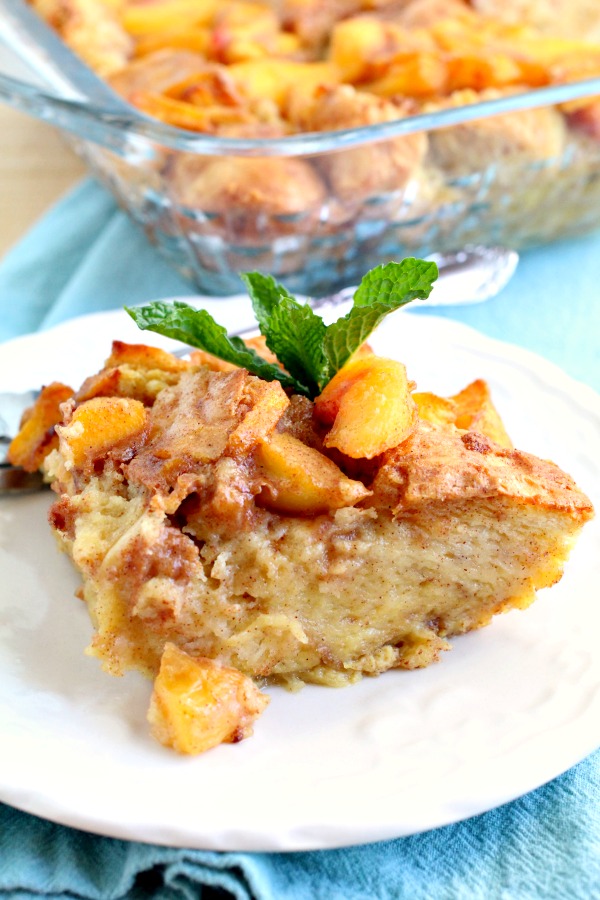 slice of peach topped bread pudding Peach Cobbler Bread Pudding