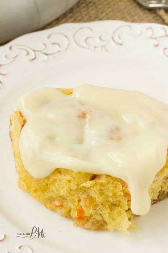 Scratch Made Carrot Cake Cinnamon Rolls with Cream Cheese Frosting recipe warm sweet rolls filled with cinnamon and butter and topped with cream cheese frosting oozing down into the warm cinnamon rolls! Great breakfast and brunch recipe. 