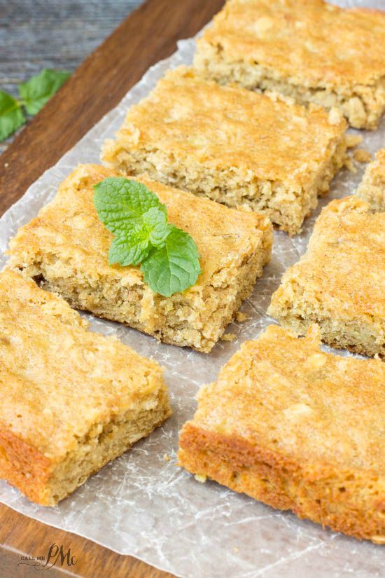 Homemade Peanut Butter Oatmeal Breakfast Blondies are loaded with wholesome ingredients like peanut butter, oatmeal and bananas. This is a hearty, on-the-go breakfast bar recipe. Dessert bars cut into squares.