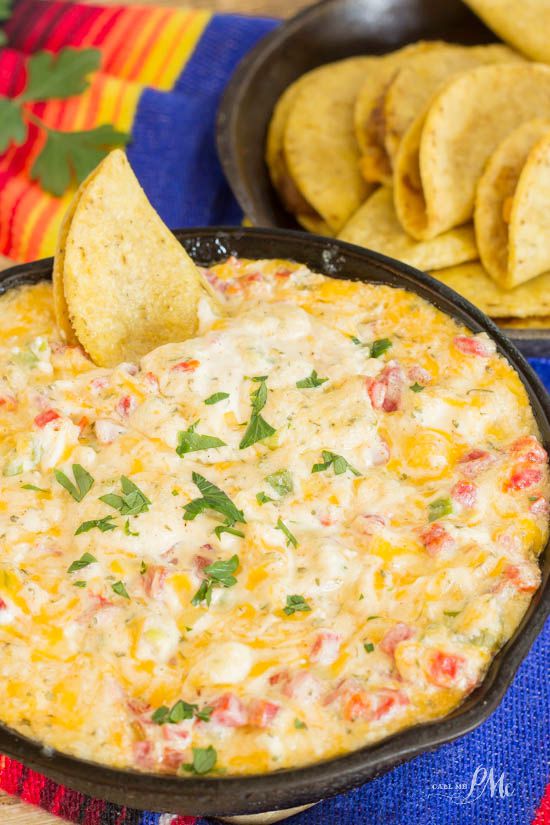 Baked Tex-Mex Pimiento Cheese Dip Recipe traditional pimiento cheese is paired with Tex-Mex flavors of cilantro and paprika in this mouth-watering hot dip. Baked Tex-Mex Pimiento Cheese Dip Recipe is chock full of pimientos, cilantro, jalapenos and more. This is one tasty dip!