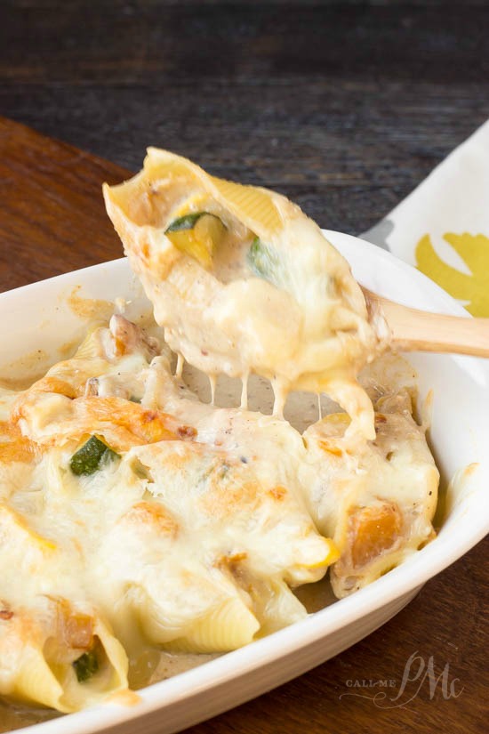 Pasta shells stuffed with tastiness -3 squash and ricotta stuffed shells casserole recipe squash and ricotta stuffed shells in a baking dish.