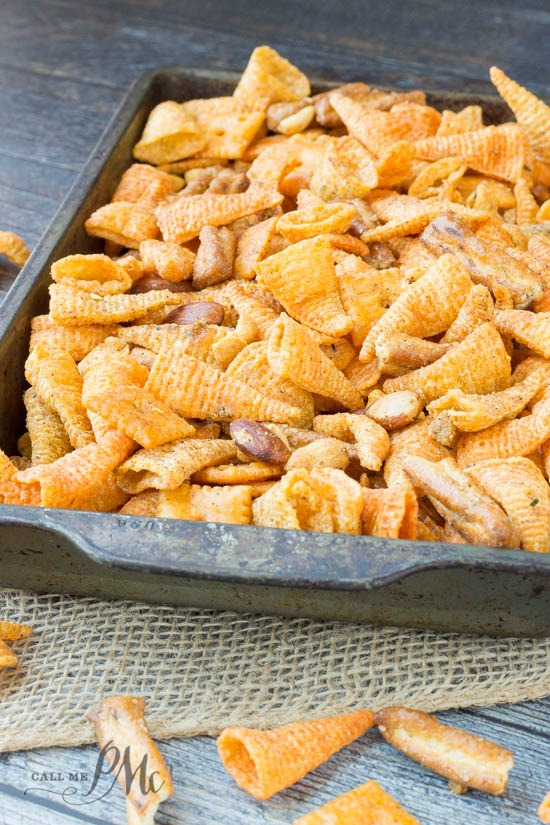 Boy Scout Snack Mix is crunchy, spicy and completely irresistible. It's great for snacking on while camping and makes a great gift during the holidays. Boy Scout Snack Mix recipe is a flavor explosion. Perfect for tailgating, snack, camping, gifts.