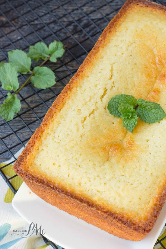 Classic Ricotta Pound Cake decadent and easy to make, you'll love this moist pound cake recipe baked dessert on a white platter.