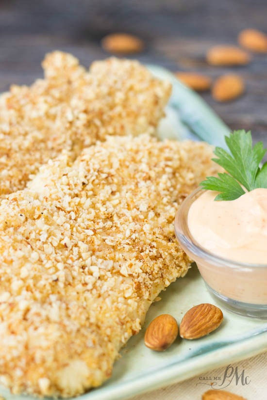 Almond Crusted Chicken Tenders Recipe, a healthier oven-baked chicken tender recipe that has that popular crunch of fried chicken.