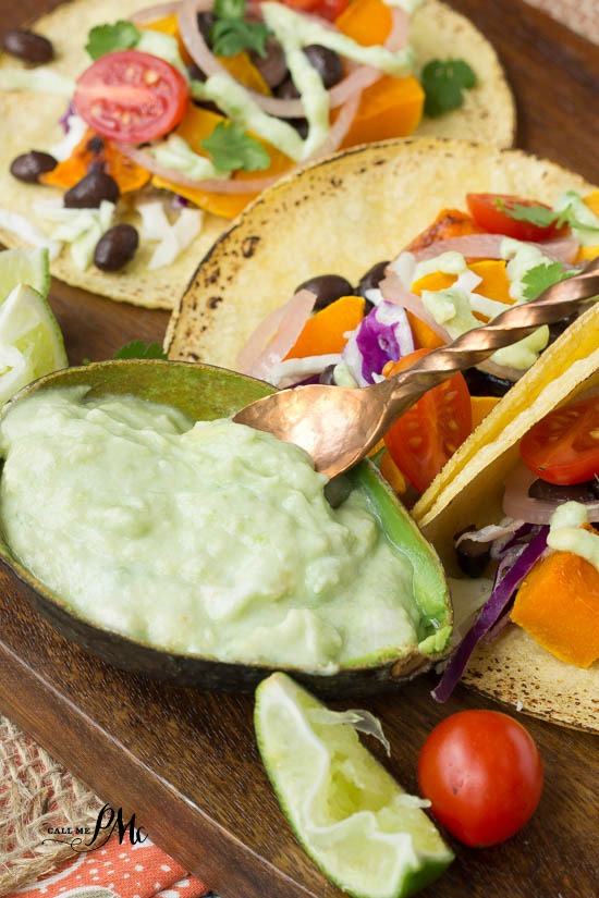 Black Bean Butternut Squash Tacos with avocado cream sauce recipe is one filling meatless main meal!