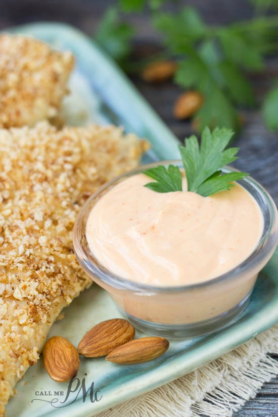 Lighter Sriracha Dipping Sauce on plate with Almond Crust Chicken Tenders