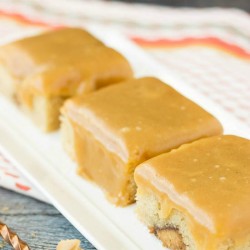 loaded peanut butter cup peanut butter blondies with peanut butter frosting