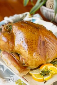 The Ultimate Smoked Turkey Recipe. Complete instructions to brine, season, stuff, and smoke a whole turkey. #turkey #smoked #smokedturkey #grilled #Thanksgiving #recipe