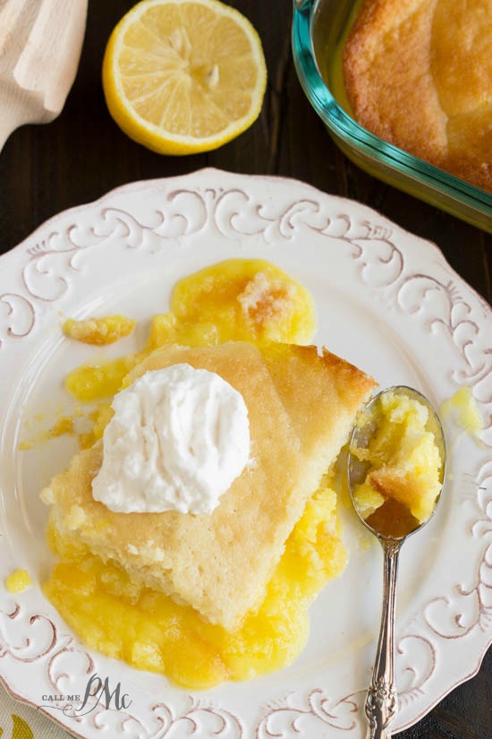 Easy Lemon Lava Cake is silky and luscious. This cake recipe is simple and easy to make! #cake #lavacake #easycake #dessert #fromscratch #lemon plated slice of yellow lava cake made with cake mix and lemon pudding.