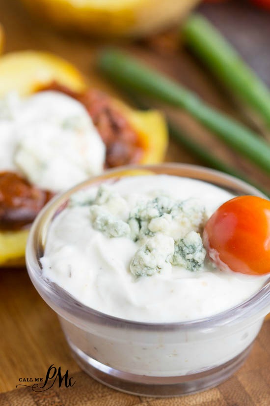 chili stuffed potato skins with blue cheese greek yogurt dressing recipe - The BEST Loaded Potato Skins recipe! They're so EASY to make and their the yummiest appetizer ever! blue cheese sauce in a small glass bowl.