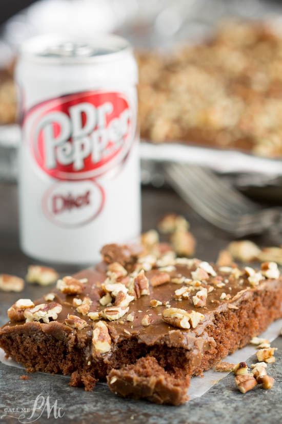 Diet Dr Pepper® Texas Sheet Cake recipe is the EASIEST and most DELICIOUS cake you will ever make!! Slice of cake with diet Dr Pepper.