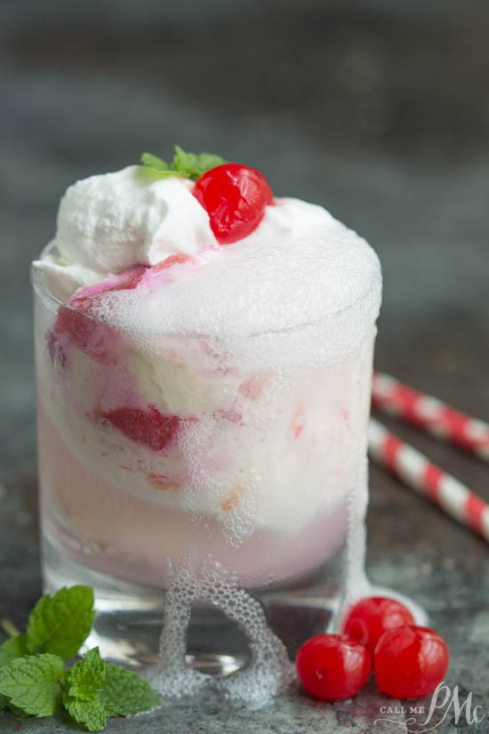 A glass full of white and pink ice cream. 7up® Cherry Float 