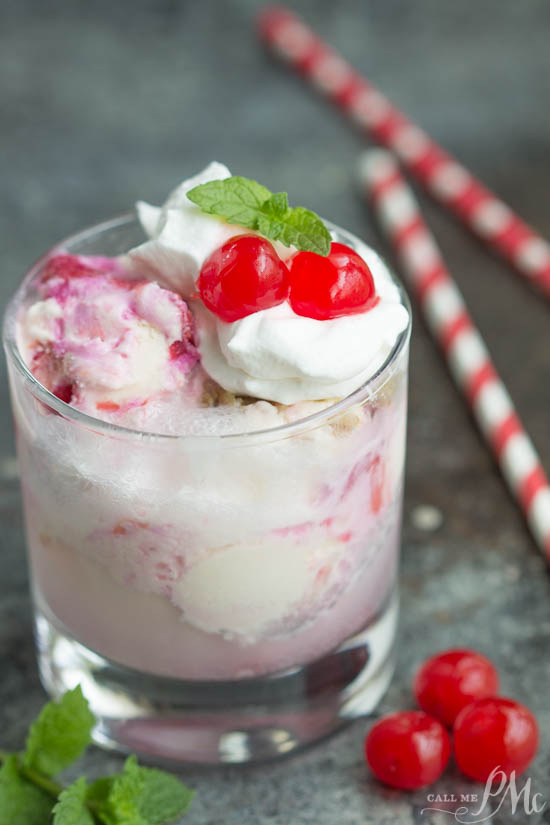 A glass full of white and pink ice cream.