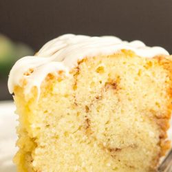 plated slice of moist cinnamon roll cake.