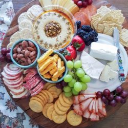 I want to teach you How to Assemble a Charcuterie Platter. It is not difficult, but a few basic rules. A Charcuterie platter is an easy and elegant way to entertain especially if you have last minute guests without much time to cook anything.
