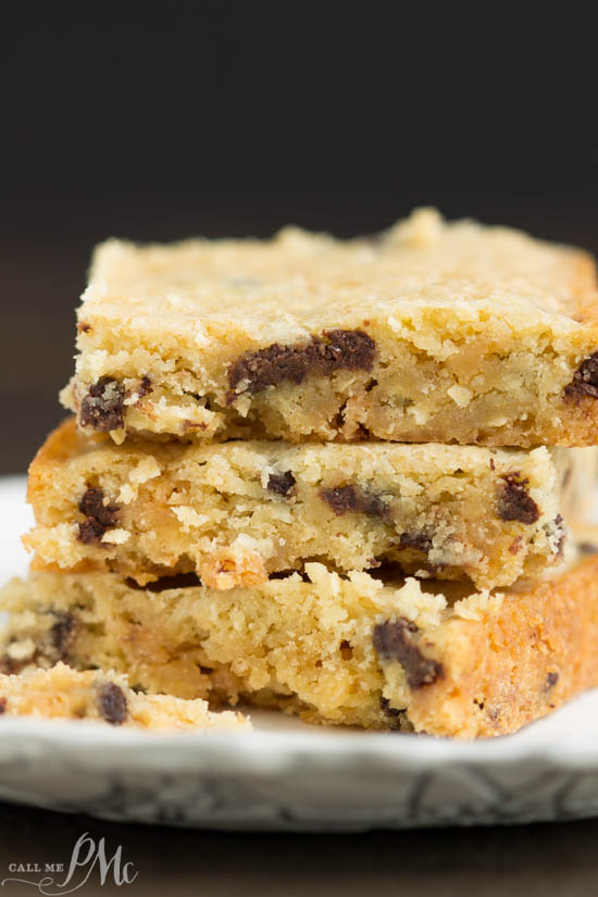 Congo Squares or pan cookie bars have a buttery and chewy texture. They are thick and chocked full of rich, semi-sweet chocolate chips, pecans, and coconut. #bars #cookies #baked #fromscratch #chocolatechips Congo Squares