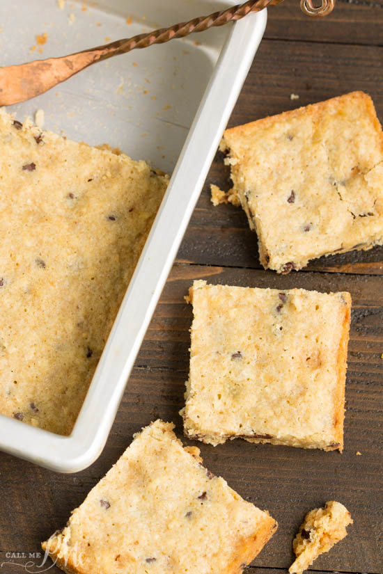 Congo Squares or pan cookie bars have a buttery and chewy texture. They are thick and chocked full of rich, semi-sweet chocolate chips, pecans, and coconut. #bars #cookies #baked #fromscratch #chocolatechips