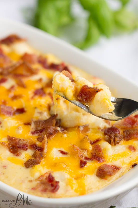 This Hominy Au Gratin casserole recipe is easy to make and super creamy. Hominy Au Gratin is an old fashioned southern staple that is a tasty and filling cheese and bacon topped side dish. Comfort food at it's best. Hominy Au Gratin casserole