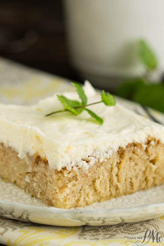Ruby Red Grapefruit Sheet Cake with Grapefruit Cream Cheese Frosting is tender, moist, sweet, and tart. If you like citrus and grapefruit, this flavorful combination is sure to satisfy! Slice of cake on saucer.