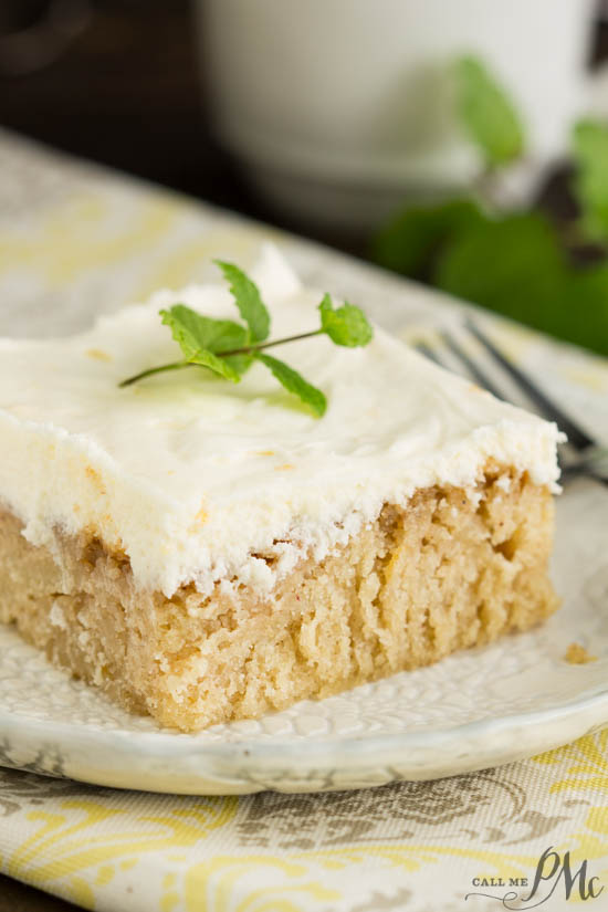 Ruby Red Grapefruit Sheet Cake with Grapefruit Cream Cheese Frosting is tender, moist, sweet, and tart. If you like citrus and grapefruit, this flavorful combination is sure to satisfy! Slice of cake on saucer.