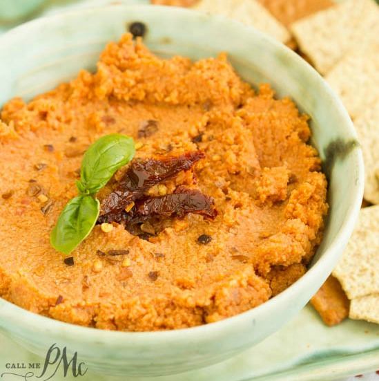 Sun Dried Tomato Hummus Recipe is creamy, spicy, and has a nice earthy flavor from the sun-dried tomatoes.