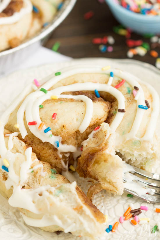 Tender and fluffy Birthday Cake Cinnamon Rolls is like having birthday cake for breakfast! Fun, festive, easy to make, and they taste heavenly! This recipe is definitely one you want to have on your breakfast roster! birthday cake cinnamon rolls