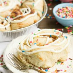 Tender and fluffy Birthday Cake Cinnamon Rolls are Fun, festive, easy to make, and they taste heavenly! This recipe is definitely one you want to have on your breakfast roster!