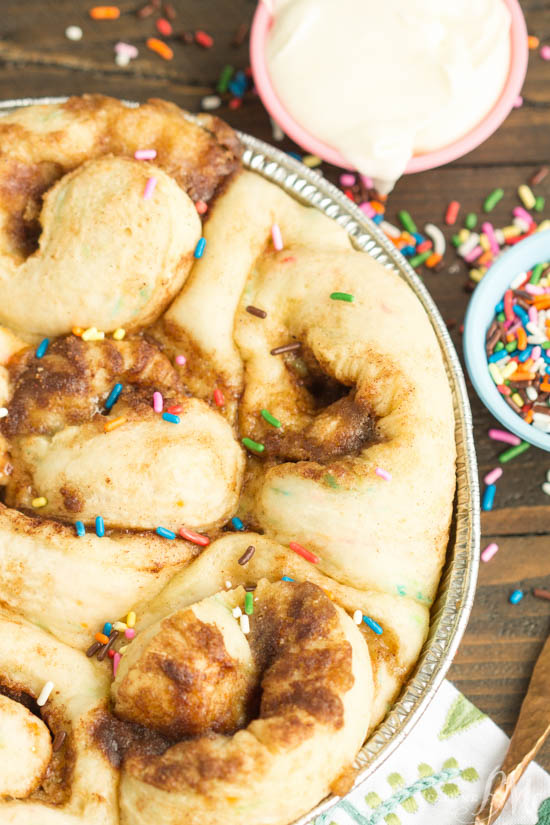Tender and fluffy Birthday Cake Cinnamon Rolls is like having birthday cake for breakfast! Fun, festive, easy to make, and they taste heavenly! This recipe is definitely one you want to have on your breakfast roster! Birthday Cake Cinnamon Rolls