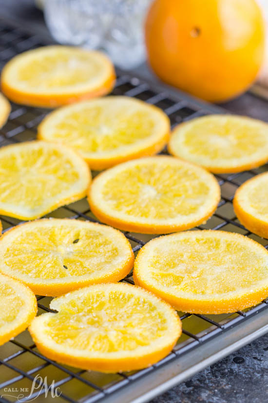 Close-up of fruit slices arranged in a single layer on a cooling rack.