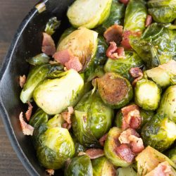 Kentucky Bourbon Braised Bacon Brussel Sprouts have lots of texture and flavor from braising them in a bourbon mixture and tossing with smokey bacon.