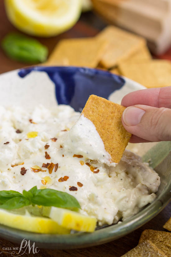 Boshamps Feta Dip is cheesy, creamy, tangy, and takes just minutes to whip up! This easy appetizer dip recipe is loaded with cream cheese, garlic and a squeeze of lemon to brighten the flavor. Heat it in the microwave and serve hot with toasted pita wedges, toasted baguette slices, or your favorite sturdy chip or cracker.