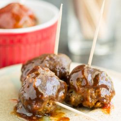 whiskey meatballs on a plate.