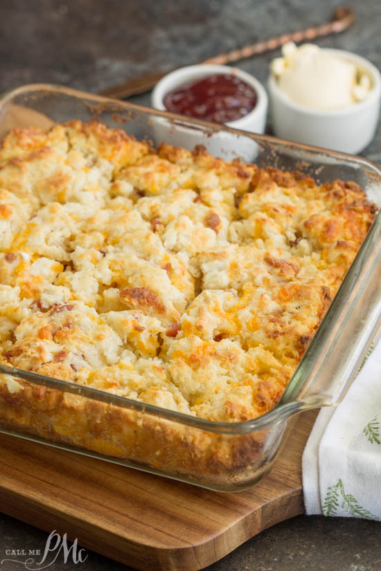 Every bite of these Bacon Cheese Butter Pan Biscuits is full of flavor from the bacon and cheese. Browned biscuits in dish.