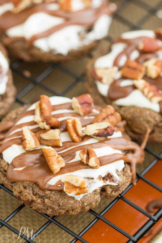 Mississippi Mud Cookies with Marshmallow Fluff and Chocolate Frosting is a delectable fudge cookie recipe topped with creamy marshmallow fluff frosting, rich chocolate ganache, and salted toasted pecans. @bobsredmill #50StatesofCookies AD Mississippi Mud Cookies with Marshmallow Fluff and Chocolate Frosting